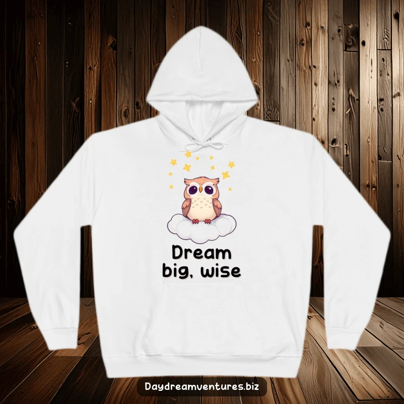 Cute owl character on a hoodie, gazing at stars from a cloud, offering cozy, magical humor.